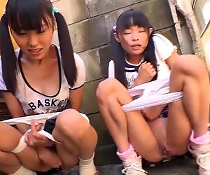 Tiny japanese schoolgirl eating ice cream